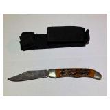 BR1…NAHC LTD pocket knife, comes with belt sheath, see pictures for details.