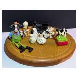 BR3…Wooden Lazy Susan base with assorted collectible figurines, see pictures for details.