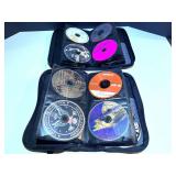 BR1…Assorted CDs, with storage cases, see pictures for details.