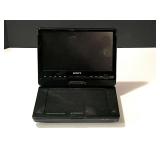 BR2… Sony portable CD/DVD player, no cord, working condition unknown, see pictures for details.