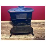 DEN… Vintage/antique small Franklin wood stove from Atlanta stove works, see pictures for details.
