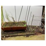 Coated wire metal shelving, also includes a planter and assorted stakes, see pictures for details.