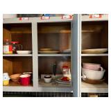 KIT…Cabinet lot marked 1170, includes all content of upper cabinets from edge of microwave to last cabinet past the sink. Items include mixing bowls, vintage platters, and assorted glassware and mug