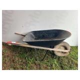 Metal with wood handle wheel barrel