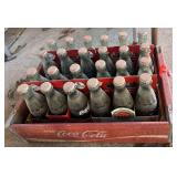 Collectible commemorative 6 ounce Coca-Cola, four 6 packs, also includes a collectible Coca-Cola wooden crate, see pictures for details.