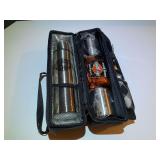 BR1… Harley Davidson coffee kit with storage/carrying case, includes thermos, cups, and spoons. See pictures for details.