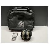 DEN… Soft sided Springfield armory bag, contains earmuffs, and a gun lock, see pictures for details.