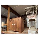 Content of above floor shelf marked 5041 to include an antique wicker bassinet, wooden ironing boards, antique wash station, wood cabinet, and more. See pictures for details.
