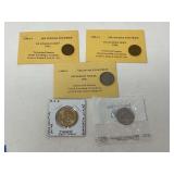 Collectible US coins to include wheat pennies, an uncirculated 2003 Missouri quarter, and an uncirculated presidential dollar, see pictures for details.