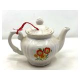 LR… Vintage teapot with gold trim and orange poppy motif, see pictures for details.