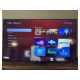 DEN… TCL Roku TV, comes with a remote, does work. See pictures for details.