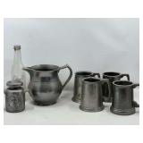 KIT…Drink set with pitcher and four tankards, believed to be pewter, pitcher is Wilton, also includes Donald’s Magnificent Milk Mug from the Walt Disney Company, see pictures for details.