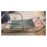 Antique metal framed sled, see pictures for details.