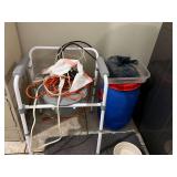 Laundry… Assorted household items to include a bedside toilet, extension cords, plastic storage barrel with lid, vintage clothes pen bag, and more . See pictures for details. ￼