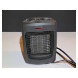 BR1…Small electric space heater, powers up, see pictures for details.