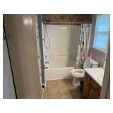 Master bath… Bathroom lot to include two locker banks with six lockers each with content of assorted toiletries, and perfumes, also includes vintage scale, home decor, and more. See pictures for det