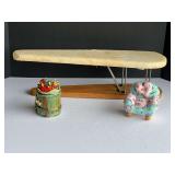 Sewing accessories to include a small ironing board, pin cushions, and more. See pictures for details.