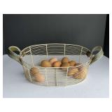 Vintage coated wire basket with faux eggs, see pictures for details.