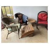 Vintage wicker chair and rocking chair, these pieces need work, also includes a unique mosaic tile table top resting on a stoneware crock, an outdoor wicker rocking chair ￼, and a rustic Adirondack 