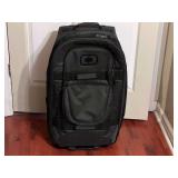 BR4… Soft sided suitcase with telescoping handle, see pictures for details.