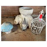 Assorted home/yard decor to include a coated wire bird cage, back hinge is broken, also includes an elephant planter, and garden mushroom, this piece is peeling, see pictures for details.