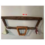 DEN… Custom wall hanging fashioned from an antique yoke/hames with assorted household items/decor, also includes a vintage wooden tennis racket press, see pictures for details.
