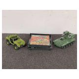 G.I. Joe toys to include tank, Jeep, and collector display case. The display case has assorted action figures, see pictures for details.