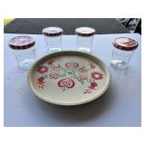 Vintage tin Lazy Susan with a floral motif, believed to be hand painted, comes with four storage jars, see pictures for details.