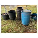 Set a four plastic various size barrels