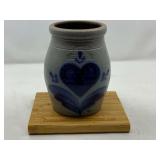 KIT…Small Rowe pottery stoneware crock, also includes a small wooden cutting board, see pictures for details. ￼