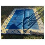 Large outdoor woven area rug, see pictures for details.