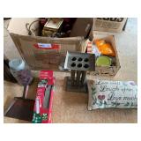 Mystery lot of assorted items to include vintage canning jar, home decor, surge protector, faux fruit, and more. See pictures for details. ￼