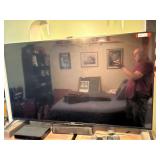 BR2.. Sony 65“ television, powers up, comes with a Bose theater system, and remotes, see pictures for details.