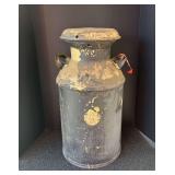 Antique milk can, see pictures for details.