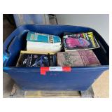 Tub of assorted auto manuals, also comes with a furniture dolly, see pictures for details.