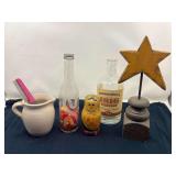 DEN… Assorted household items to include a vintage Pfaltzgraff creamer, nesting dolls, and other home decor. See pictures for details.