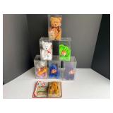 Beanie baby assortment, comes with seven display cases, see pictures for details.