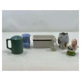 KIT… Assorted kitchen and home decor items to include a vintage Homer Laughlin sugar packet holder, a petite bud vase, believed to be vintage McCoy pottery, porcelain egg shaped vase, and more. Six 