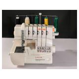 BR4… Singer Quantum Lock 14 T967 DC serger, no cord, working condition unknown, comes with workbook, see pictures for details.