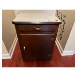 BR1..Wooden one drawer, one door cabinet with enamel metal top, see pictures for details.