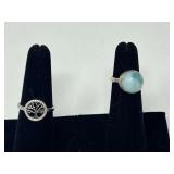 Ladies sterling silver tree of life ring, stamped 925, also includes a sterling silver ring stamped 925 with a round cabochon, believed to be Larimar , see pictures for details. ￼