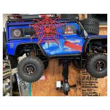 Radio control car, seller states runs but needs a driveshaft, comes with controller, and mount, see pictures for details.