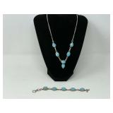 Ladies silver bracelet and necklace, both are stamped 925 with stones resembling Larimar, necklace is lariat style, see pictures for details.