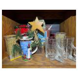 BR3… Shelf lot marked 1567, includes all content of shelf of assorted Christmas decor to include Coca-Cola Christmas mugs, Christmas stockings, flameless candles, and more. See pictures for details.