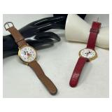 Lorus large face Mickey and Minnie Mouse watches, see pictures for details.