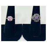 Ladies silver rings, both pieces are stamped 925 to include a purple amethyst colored flower ring, and one with a pink stone that resembles pink topaz, see pictures for details.