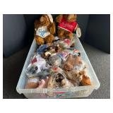 Storage tub of assorted beanie babies, and more. See pictures or details.