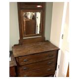 BR4… Vintage/antique three drawer chest of drawers, has a tilt mirror, items that may be seen in pictures are sold in separate lots, see pictures for details.