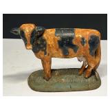 Cast metal cow doorstop, see pictures for details.