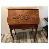 DEN…Antique Oak Larkin secretary with slant front, one drawer handle is missing, comes with antique oak spindle back chair, it appears the leather has been replaced in the seat, see pictures for det